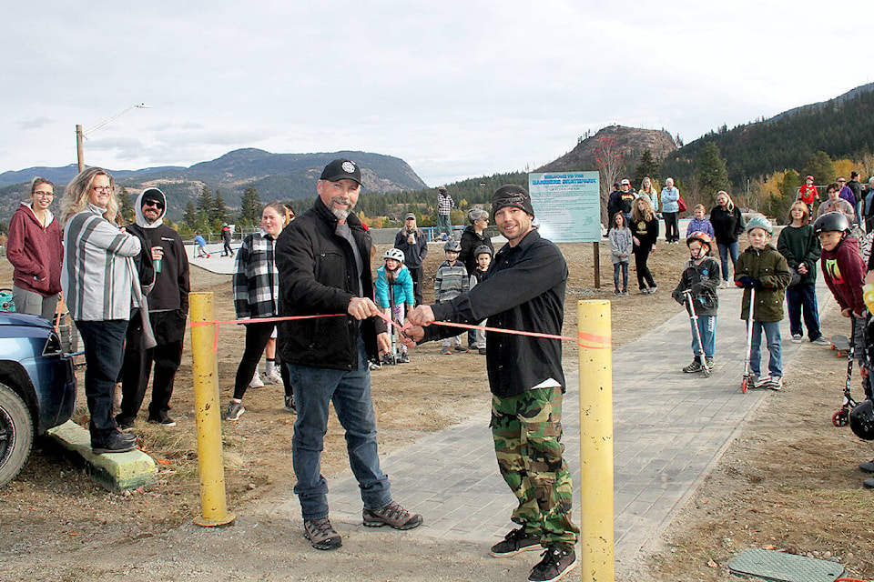 District of Barriere Mayor Ward Stamer and Barriere Skatepark Society representative Dustin Doherty were on hand to cut the ribbon to officially open the community’s new skatepark thanks to numerous individuals, groups, organizations and businesses who donated funding of approximately $175,000 raised over a seven year period to see the project become a reality. (Jill Hayward photo)