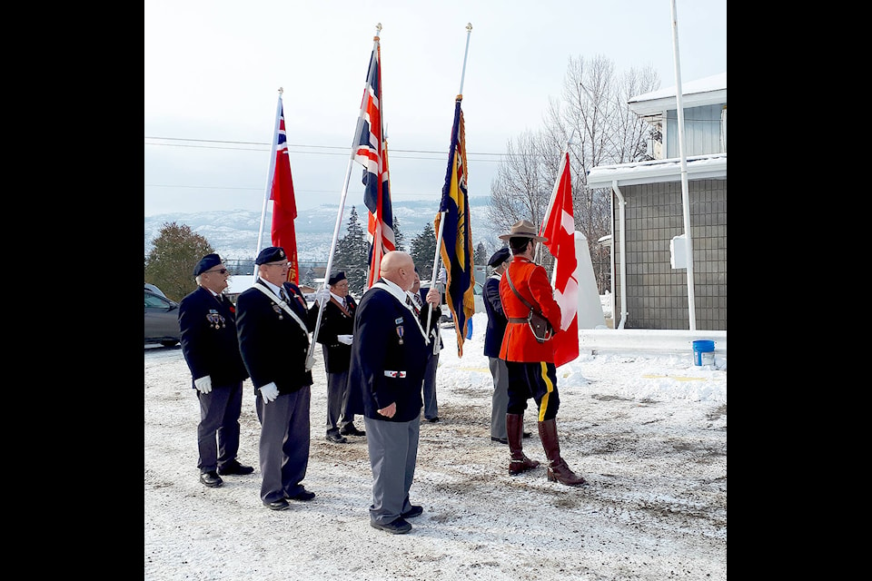 Barriere Legion Branch 242’s colour guard ready themselves in front of the cenotaph on Nov. 11, for Remembrance Day ceremonies inside the Legion Hall. (Jill Hayward photo)