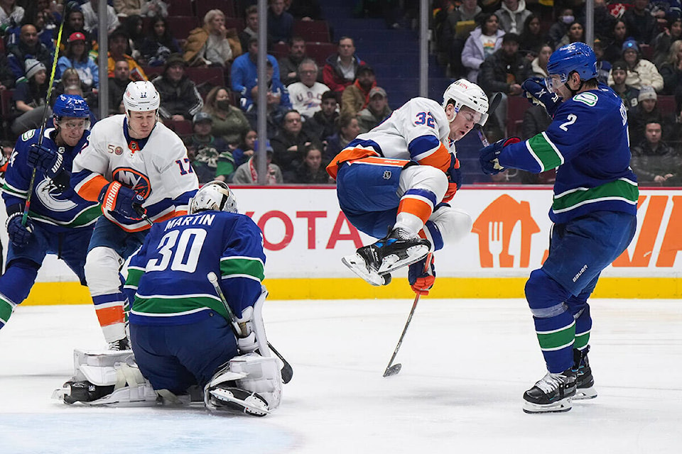 31479497_web1_230103-CPW-Islanders-Canucks-canucks_1