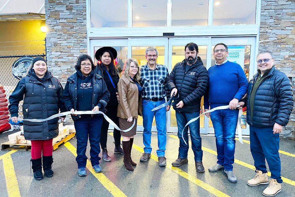 It was a heartfelt goodbye from the previous owners Shawn and Suzie Fadear and an embracing welcome to the Simpcw Resource Group (SRG) during a ribbon cutting ceremony held Jan. 9 at the Timber Mart store. Pictured from left to right are: Alison Green, Tina Donald and Amanda Celesta, Simpcw councillors, previous Timber Mart owners Suzie Fadear and Shawn Fadear, Simpcw Chief George Lampreau, SRG CEO Paul Donald and Keith Matthew SRG Chair. (Photo submitted)