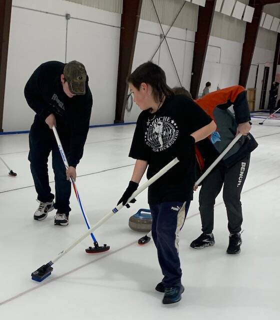 31915356_web1_230223-NTS-curling_7