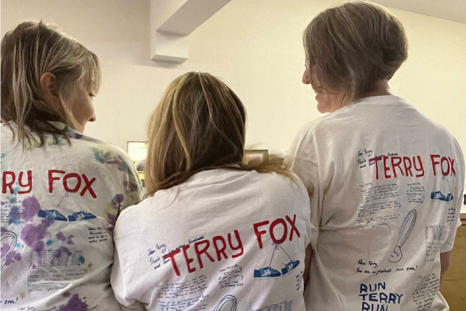 Messages of love for Terry Fox displayed on this year’s Terry Fox Run tshirts on sale in Barriere in support of Cancer research. L-R: Kathy Cooper, Lisa Quiding, Michelle Johnson (Photo Submitted)