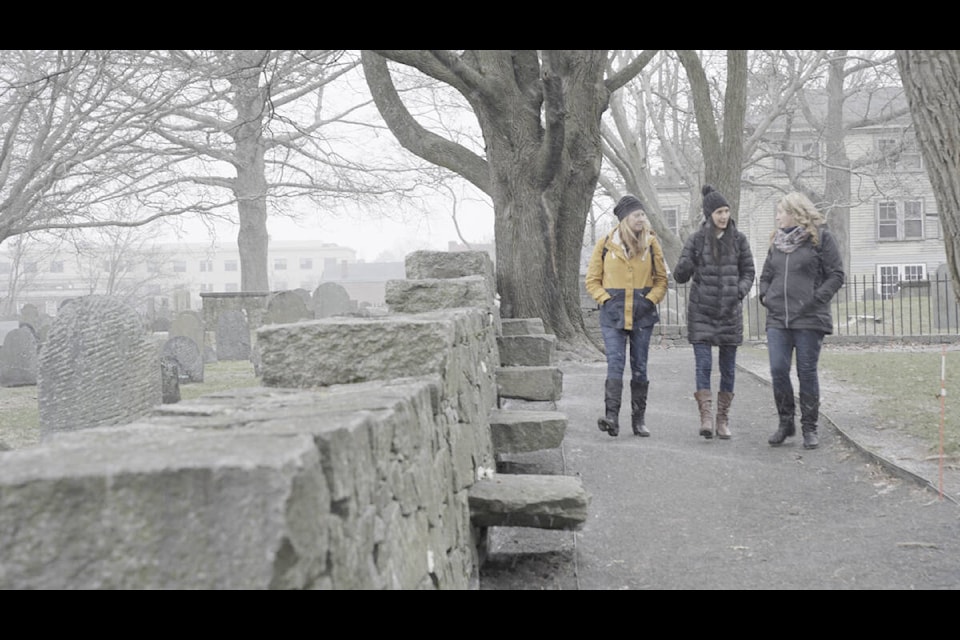 Leanne Sallenback (left), walks through a graveyard in Salem with Kelly Ireland and Corine Carey while filming History’s Most Haunted last winter. (T+E photo)