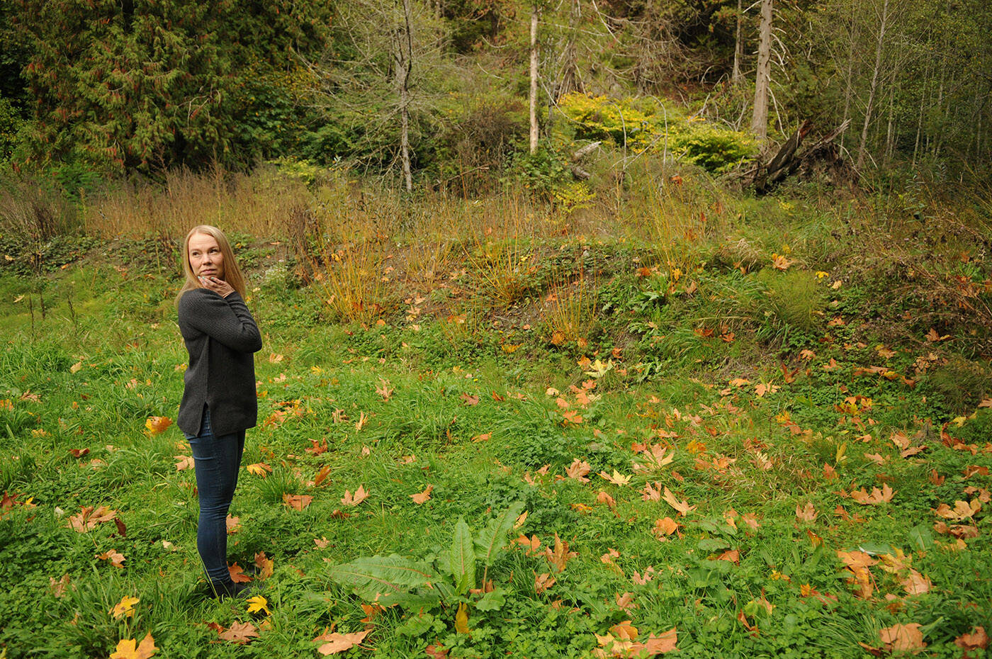 Chilliwack River Valley resident Wendy Hornberg stands in the backyard of her property on Oct. 17, 2023. After nearly two years, she and other Chilliwack River Valley residents are still without resolution after their homes were deemed unsafe to live in, or destroyed, in the floods and mudslides in November 2021. (Jenna Hauck/ Chilliwack Progress)