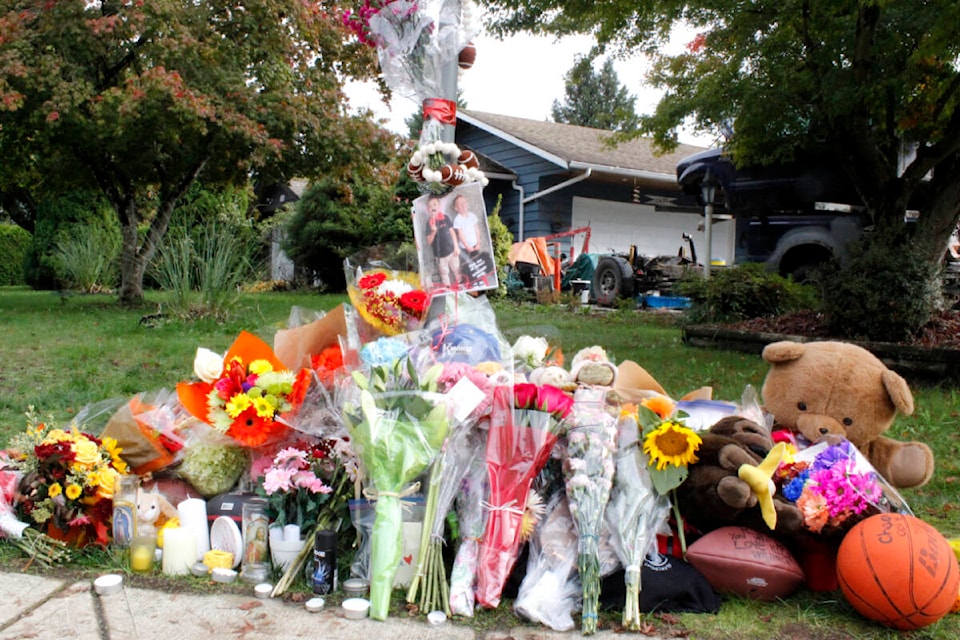 A memorial was established at the corner of 116A Avenue and 196B Street for 12-year-old Chace Nicol, who was killed while cycling to school on Oct. 18. (Brandon Tucker/The News)