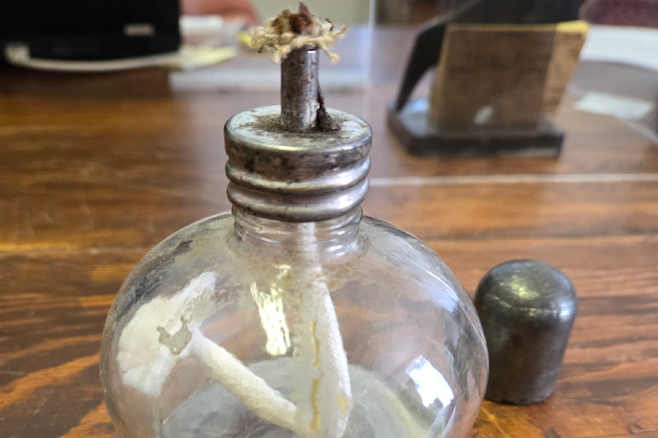 The alcohol burner or Bunsen Burner was used to heat up small amounts of chemicals and made of glass, stainless steel, brass or aluminum. You can view this burner at the North Thompson Museum at 343 Lilly Road in Barriere. 