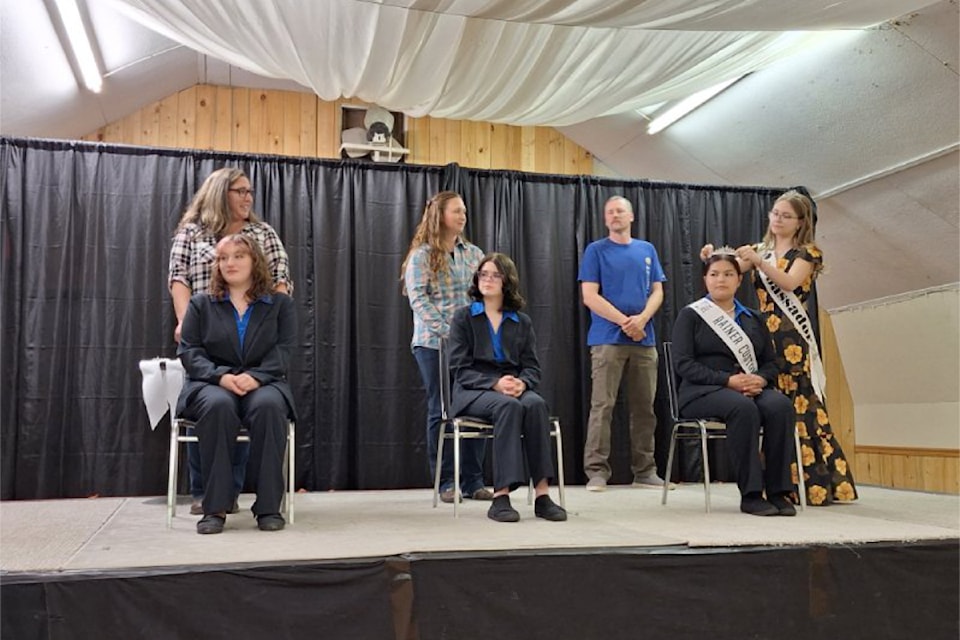 North Thompson Fall Fair and Rodeo Ambassador Program sponsors (back row, from l) Ashley Wohlgemuth, Jen Amos, and Ben Rainer supporting their candidates for 2024 (front row from l) Morgan Wohlgemuth (sponsored by Sam's Pizza & Rib House), Alexis Amos (sponsored by Carl's Hay Sales), and Jayde Nickel (sponsored by Rainer Custom Cutting). Reigning ambassador Jesimae Harrison crowned each candidate on June 21.  