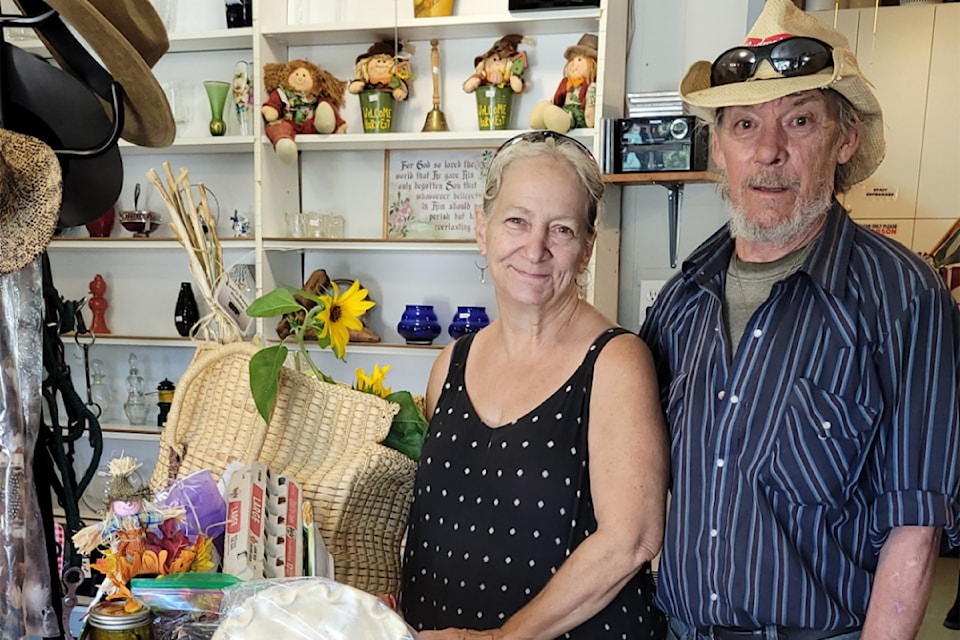 Debbie Worthington, left, and Dave Worthington were the lucky winners of the Annex Thrift Shop's Fall Fair themed (Home for the Harvest) community gift basket during fair week in Barriere.