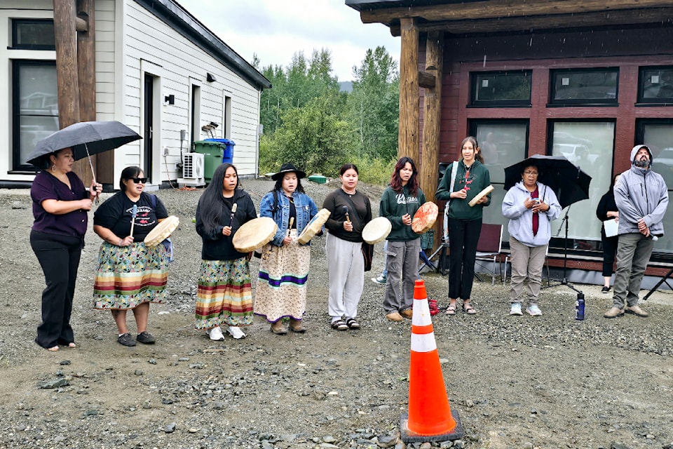 Simpcw drummers singing the honour song for the housing project at Chu Chua on Aug. 27.