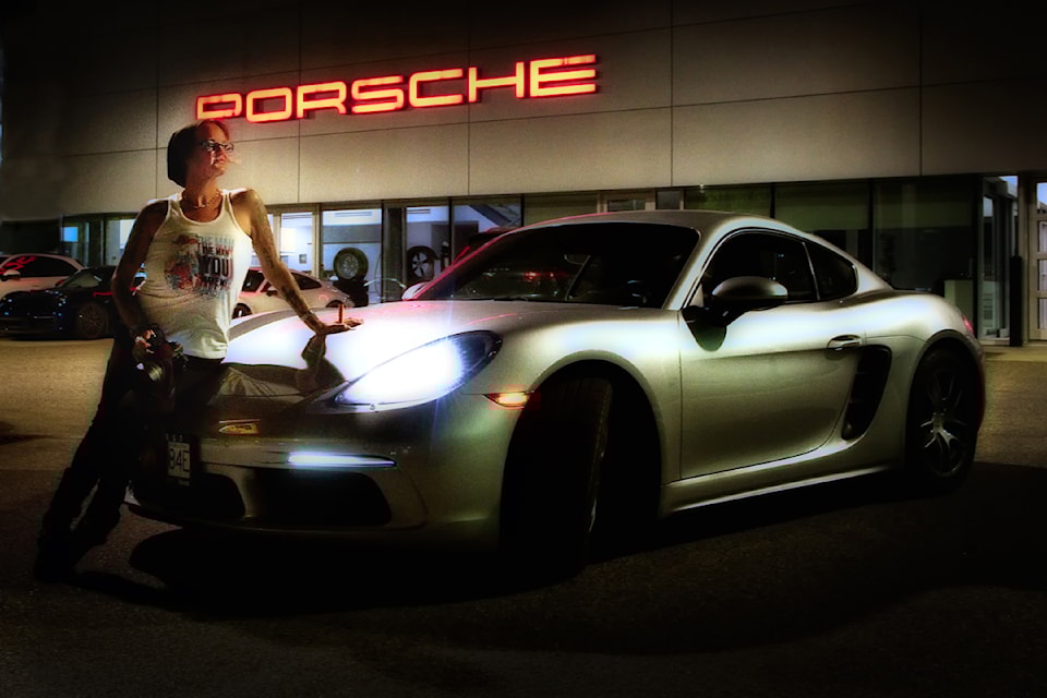 Photographer John Enman's photo of friend Jo in a 'different light' during an auto shoot. 
