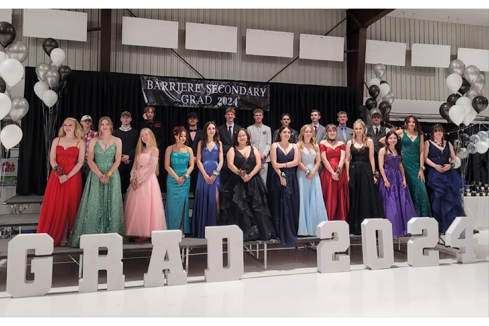 Barriere Secondary graduates in formal wear on June 15 for the dinner at the Barriere Curling arena. 
(from l) Back row: Kane Parks, Zack Zimmerman, Doug Hyslop, Thomas Trembley, Fraser Schilling, Drew Pederson, Dontay Parish, Cole Harris, Cohen Hunt, Anthony Genier. Front row: Cassidy Calahasen, Caydence Ewert, Teagen Beeton, Ilsa Magrath-Beeton, Ava Jules, Alexis Nelson, Kaydence Kolodiazny, Leilani Celesta, Bobby-Raye Farrow, Katie Goffic, Harmony Trommeshauser, LJ Elliot, Jessecca Leng.
Photo / Angeline Farrow