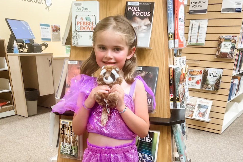 Barriere Library Summer Reading Club mascot Rackie has a new home in Barriere with new friend Kade Panio. 