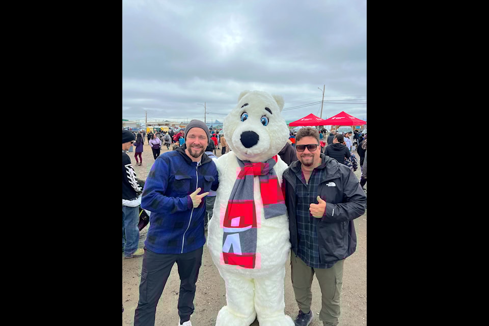 Frederik Elsner, left, and his brother Christian celebrate Nunavut Day on July 9.