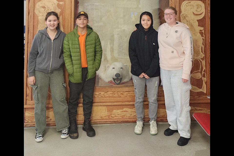 Chesterfield Inlet athletes, from left, Nevaeh Sammurtok (silver medal), Chael Sammurtok (gold medal), Caira Tanuyak (injured) and Kayalaaq Leishman-Brocklebank (sliver medal) put in a strong showing at their first-ever wrestling tournament in Edmonton in November.