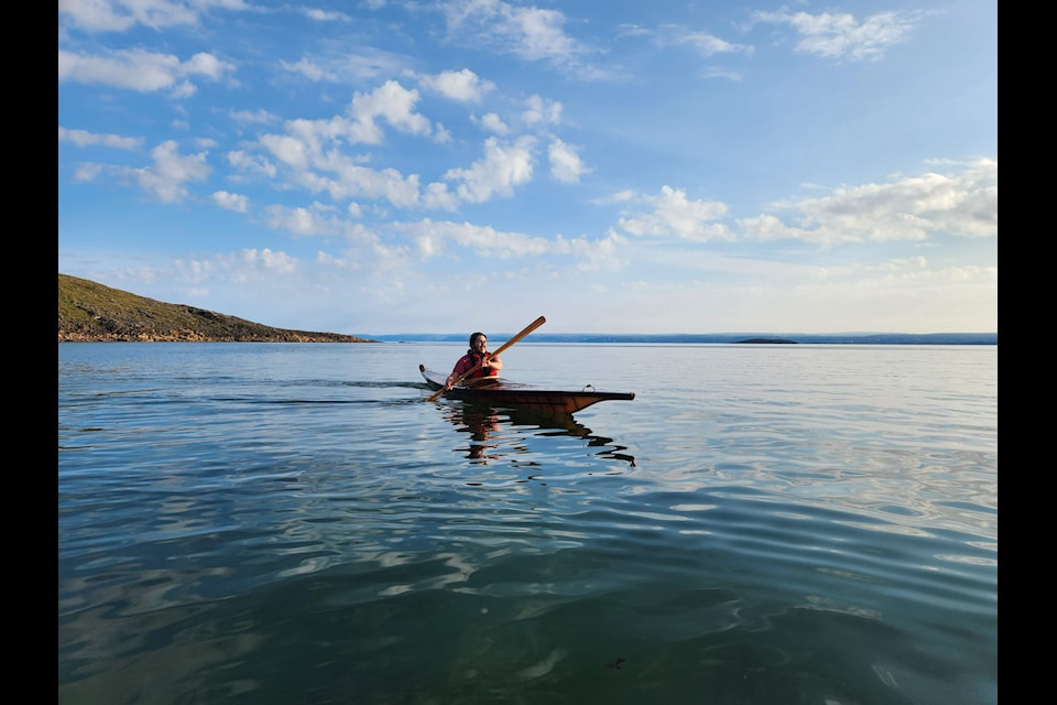 Aasivak Arnaquq-Baril paddles the qajaq he made for the Canadian Canoe Museum in 2023.