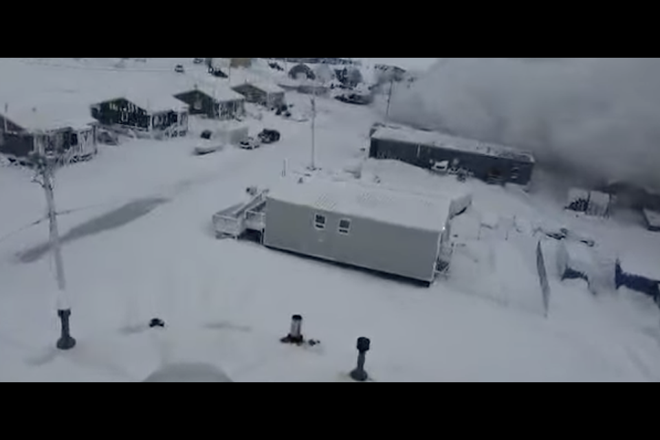 Smoke can be seen coming from the arena in Iglulik after a fire started there early Wednesday morning. It resulted in a total loss of the structure.