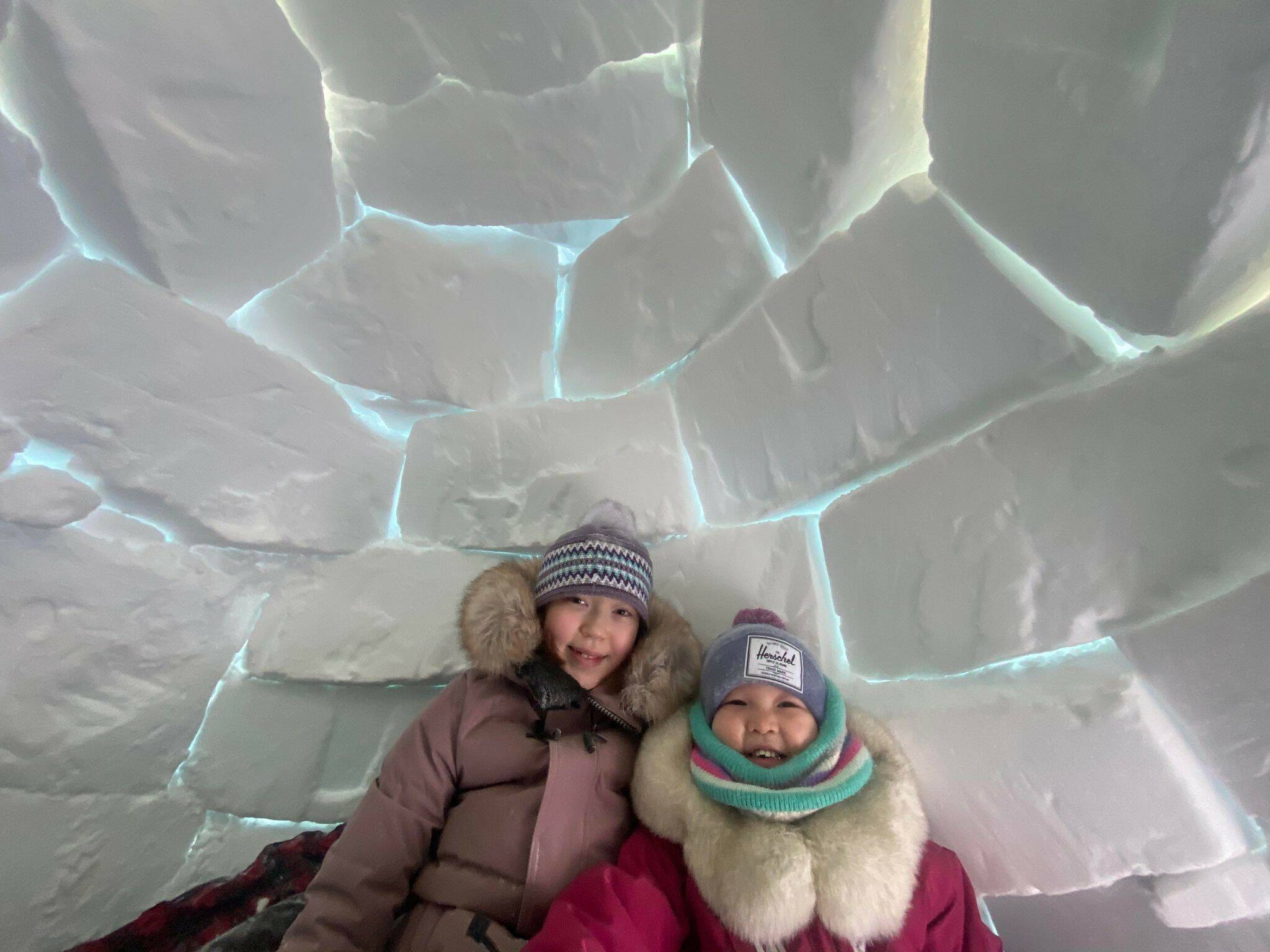 Come on in! Heres 12-year-old Kendra Tulugak OGorman Nakashook and little sister 4-year-old Olivia Neolik OGorman Nakashook happily sitting in their iglu. Built by their house on airport road in Cambridge Bay. Photo courtesy of Shelly OGorman