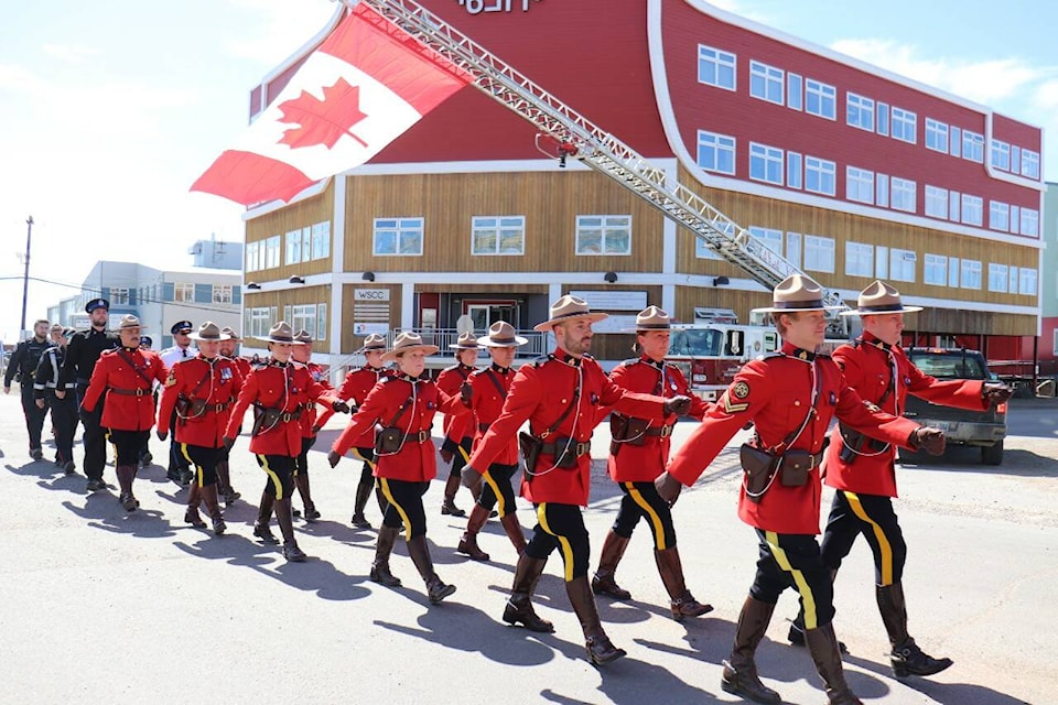 29614107_web1_220704-NUN-RCMPMarch-March_1