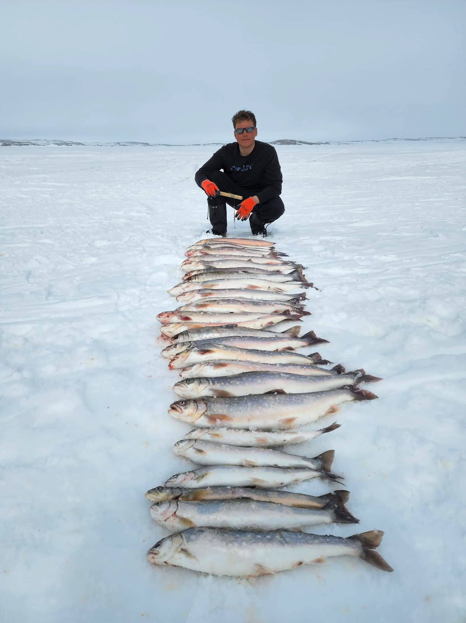 30329831_web1_220912-nun-The-ups-and-downs-of-hunting-in-Nunavut-Olafchristensenfishharvest_1