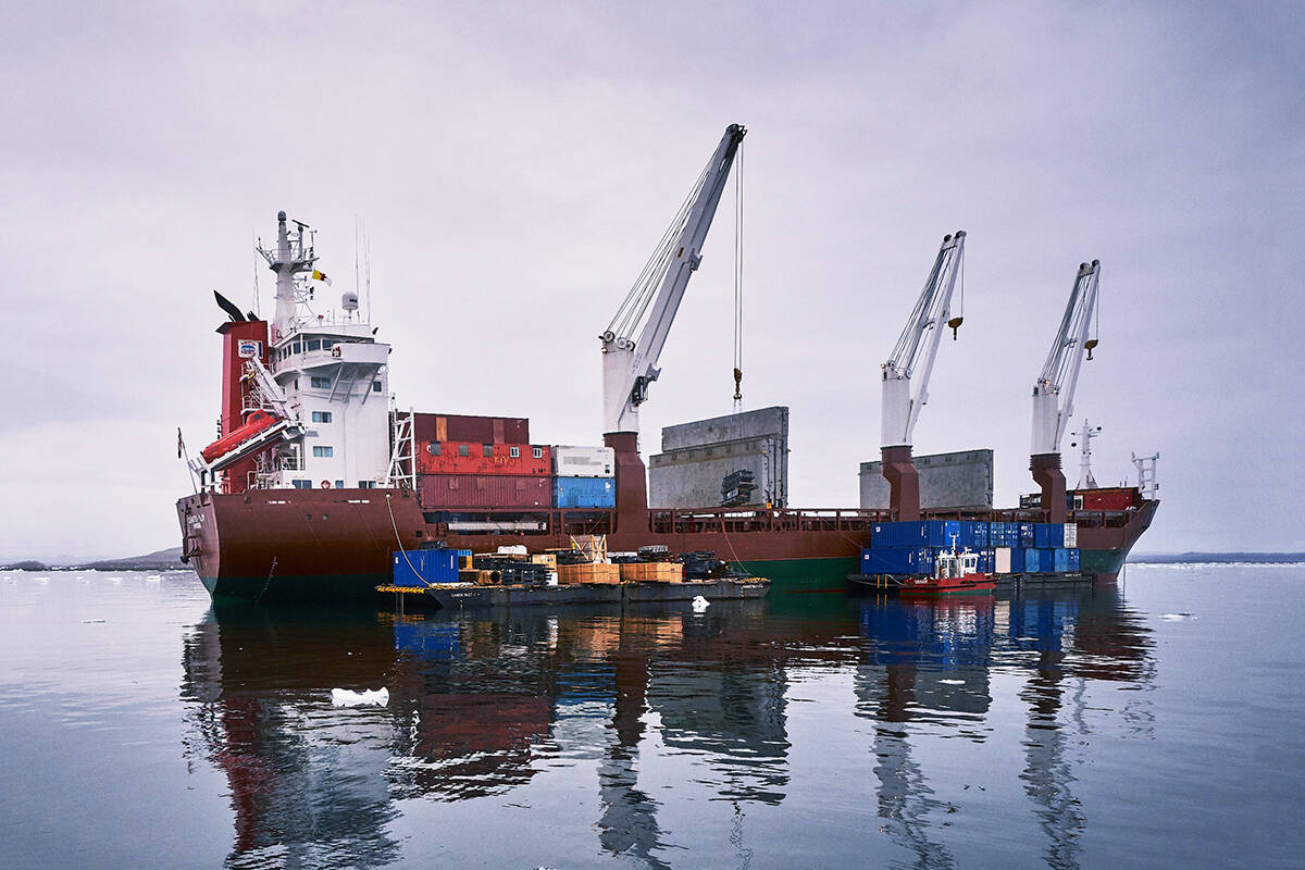 NEAS MV QAMUTIK unloads specialized construction materials and containers in Iqaluit, Nunavut, using advanced lightering operations including heavy lift, tugs and barges, for safe, efficient and reliable cargo discharge to shore.