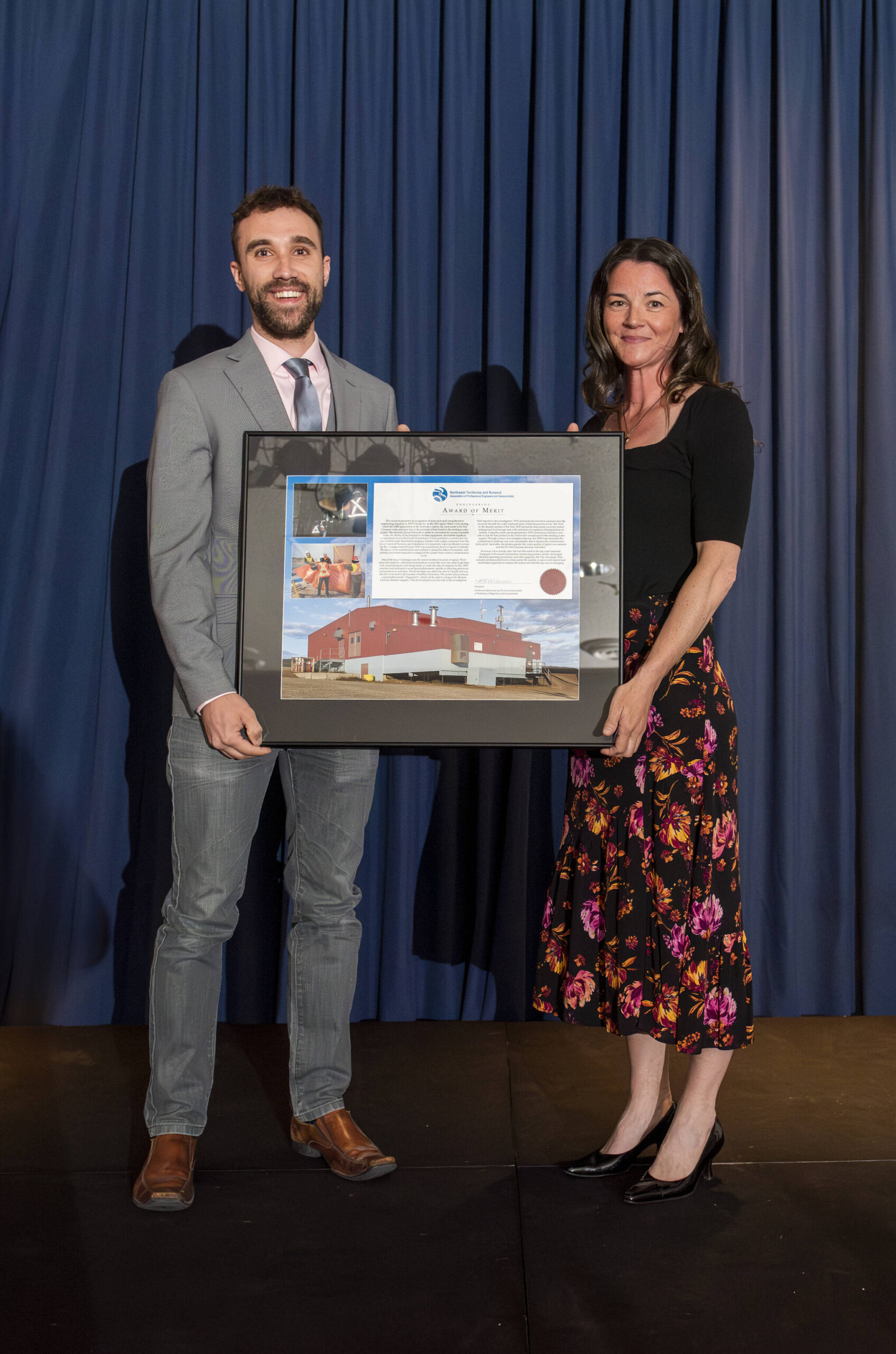 NAPEG president Melanie Williams presents the 2023 Engineering Award of Merit to WSP Canada Inc., with Ian Moran, EIT, accepting the honour. Photo supplied