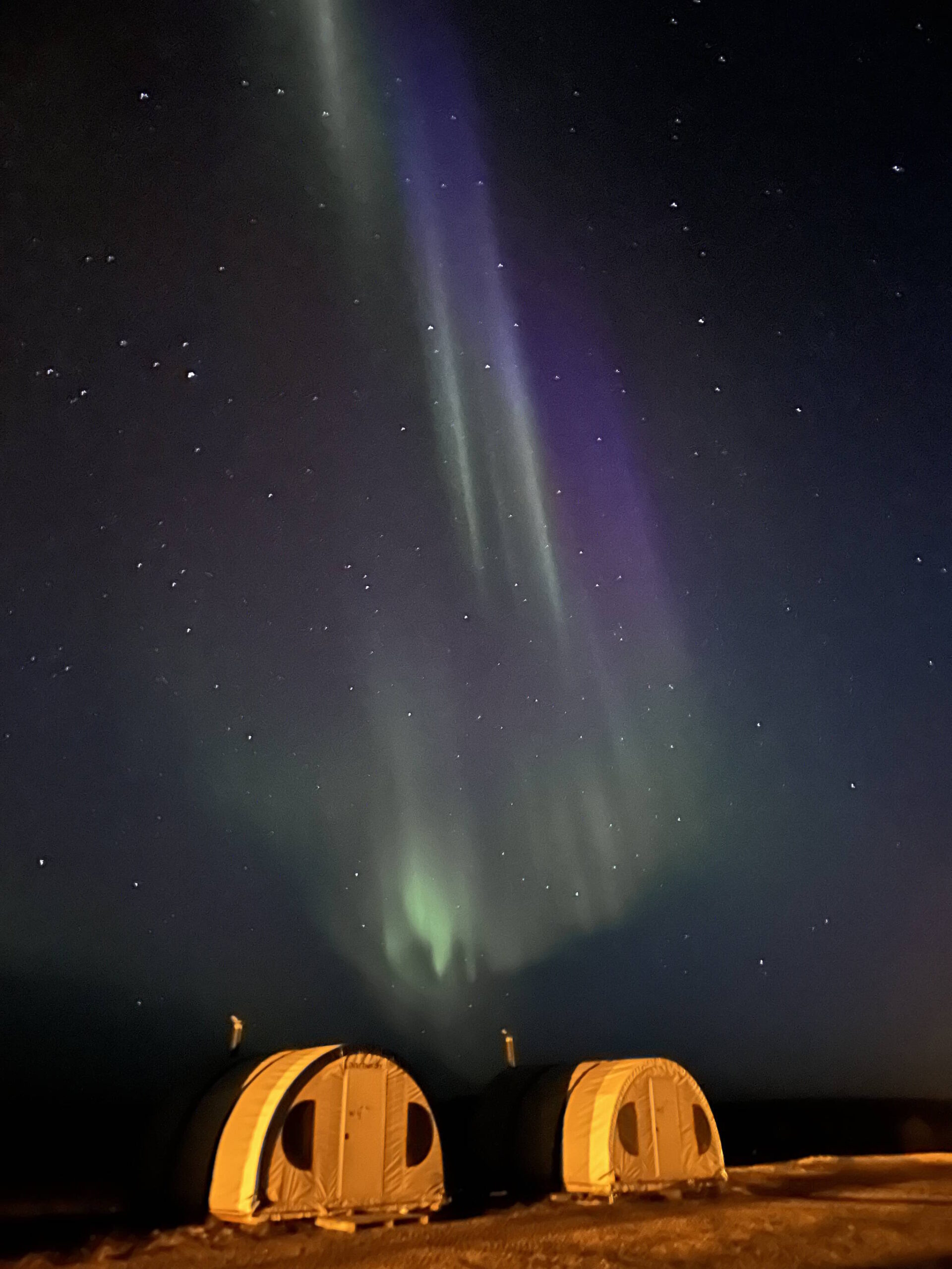 Northern lights dance above the Angilak Projects Nutaaq camp, approximately 350 km west of Rankin Inlet. Photo courtesy of Latitude Uranium Inc.