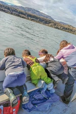0110Sadie Vincent-Wolfe Sadie Vincent-Wolfe Iqaluit Waiting for the tide to go down, kids were watching the jellyfish float by, at Sarguk near American Island, Sept. 11, 2018.
