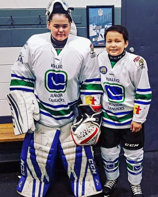 Jimmy Ollie, left, and Frances Uppahuak are ready for action before the MICEC Annual Indigenous Minor Hockey Tournament in Winnipeg last month. Photo courtesy of Gleason Uppahuak