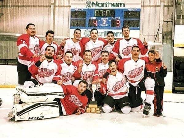 The 2017 Toonik Tyme senior men's champion Canadrill Red Wings of Rankin Inlet are, back row from left, Nick Dunphy, Roy Kopak, Roger Tagoona, Cody Dean, Keith (Butch) Sigurdson and David Clark. In the middle row, from left, are Andrew Simms, Chad Taipana, Pujjuut Kusugak, Rodney Taparti, Shack Merasty and Alaana Groves (stick boy). In the front from left, James Merritt and Panniuq Karetak in Iqaluit earlier this month. - photo courtesy of Lori Tagoona