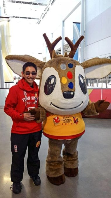 Rocco Canil of Iqaluit hangs out Waskasoo, the mascot of the 2019 Canada Winter Games, in Red Deer, Alta., on Feb. 27. Canil seemed just happy to be there and why not? photo courtesy of Sonja Lonsdale
