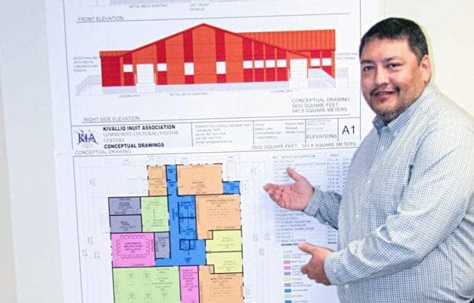 Kivalliq Inuit Association (KIA) president David Ningeongan displays plans for the Cultural Centre for Chesterfield Inlet at the KIA office in Rankin Inlet on Nov. 2, 2018. Darrell Greer/NNSL photo