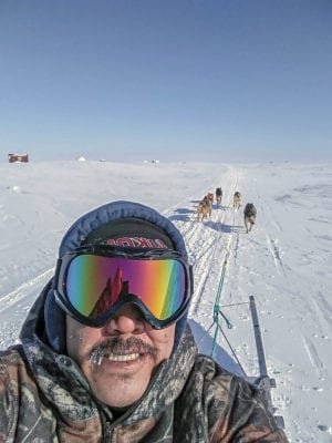 0804Michael Akaralak.jpg Michael Akaralak Arviat I've been dog sledding for 27 years now, before the bad weather, this is me about to teach my dogs. My first time dog sledding was in 1994, my dad and my uncle taught me how. In 1994 we had 27 people in my town who had dog teams, but now in 2019 just two people have dog teams.