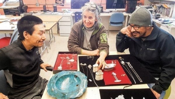 Jewelry and metalwork second-year student Peter Nowkyook, left, instructor Ellen Fraser and first-year student Gregory Morgan discuss the various student pieces that will be exhibited at the L.A. Pai Gallery in Ottawa May 11 to 31. Michele LeTourneau/NNSL photo