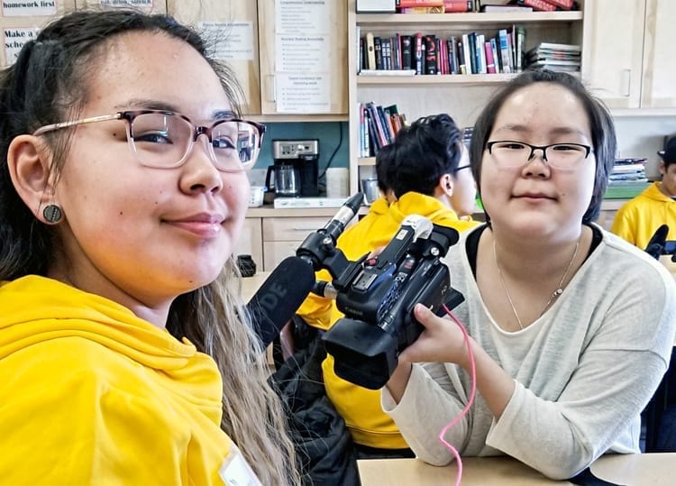 John Arnalukjuak High School students Chasity St. John, left, and Katy Suluk of Arviat are all smiles as they close-in on a silver medal in the Video Production category of the Skills Canada Nunavut competition in Iqaluit on April 27, 2019. Photo courtesy Gord Billard