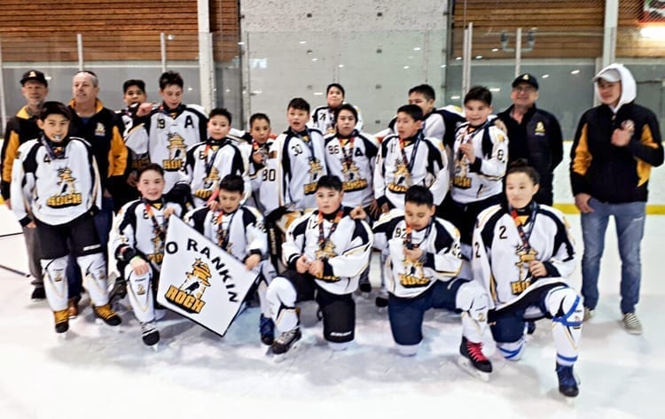 Spring Festival on Ice Tier 1 champion Rankin Rock peewee A team are, back row from left, Steve Sayles (coach), Dave Wiseman (coach) Luke Siksik, Gregory Wiseman, Liam Tattuinee, Darren Jr. Ikakhik, Preston Kaludjak, Seth Hamilton, Kadin Eetuk, Guili Issakiark, Kalluk Burton, Payton Kabluitok, Simon Wiseman (asstant coach), and, front from left, Michelle Okpatauyak, Ben Kusugak, Kylan Saviakjuk, Inuk Kowmuk, Ben Tulugak and Mia Autut in Edmonton, Alta., on March 31, 2019. Photo courtesy Nangmalik Wiseman