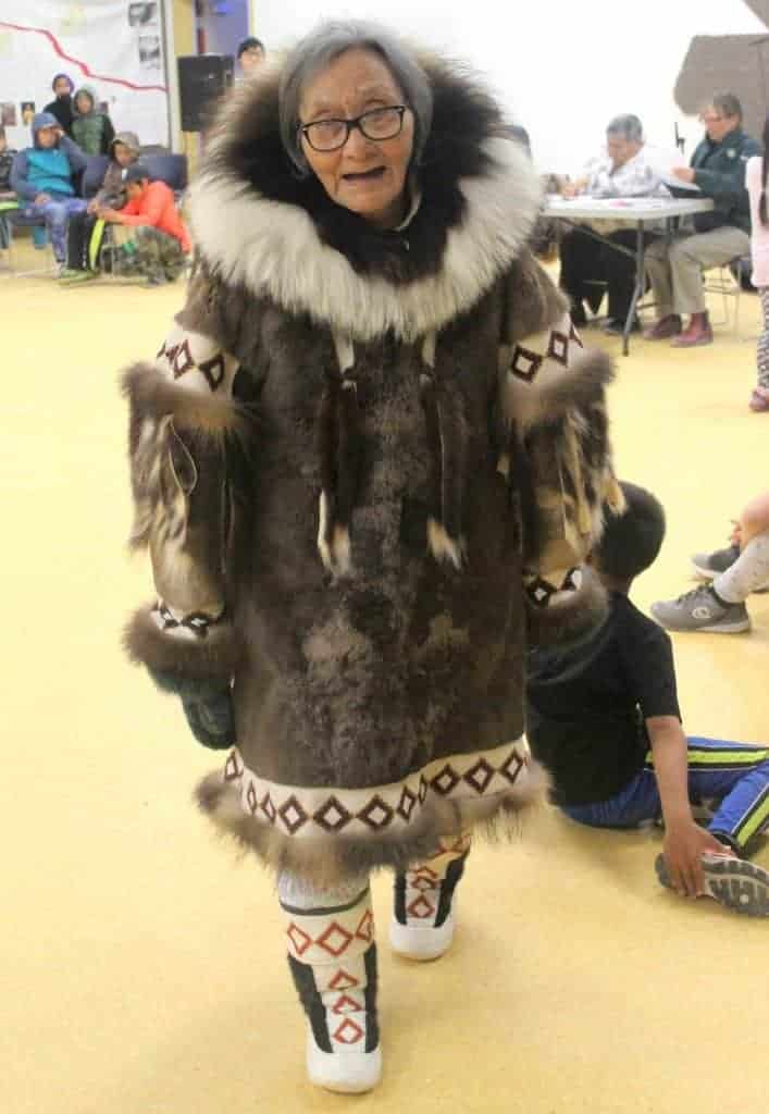 Elder Martha Atkichok dresses in a seal skin parka at the Umiyaqtutt Festival fashion show. In the modern clothing category, Salomie Qitsualiq prevailed and earned a $1,000 gift card from the Hamlet of Gjoa Haven. Claudia Apiana's second place prize was $750 while Mollie Apiana received $500 for third place.