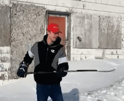 Austin Caza of Iqaluit shows off his stickhandling skills with a roll of toilet paper outside the old Hudson's Bay store in Iqaluit earlier this month. The video was put together by Laisa Kilabuk and has generated plenty of positive feedback. image courtesy of Laisa Kilabuk