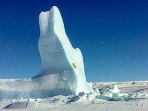 Winner:<br /> Jessica Tinashlu<br /> Naujaat<br /> My husband and his hunting buddy went polar bear hunting over the long weekend and came across this iceberg, and a polar bear was running away and the cub is climbing up the iceberg. This was 116 miles north of Naujaat.