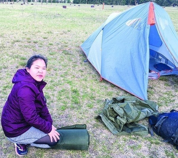 Naujaat cadet Cpl. Beatrice Kaunak sets up camp during silver star training at Birds Hill Provincial Park near Winnipeg earlier this month. Photo courtesy of Lloyd Francis