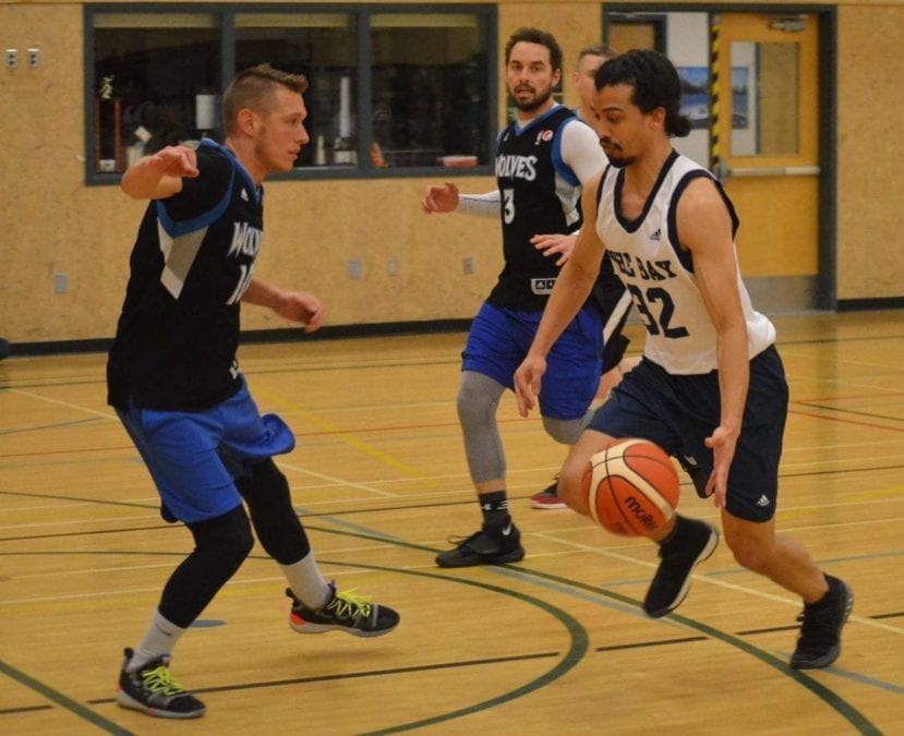 Nathaniel Cziranka-Crooks of Cambridge Bay looks to get past the guard of Yellowknife's Simon Markowski during the men's final of the Arctic Shoot-Out basketball tournament in Yellowknife on May 12. James McCarthy/NNSL photo 
