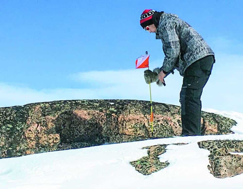 Cadet Chief WarrantOfficer Terance Mapsalak sets up an orienteering course during a cadet expedition on the land near Naujaat on May 12. The corp has received an 11th-hour reprieve and is trying to renew its cadet program this school year. NNSL file photo