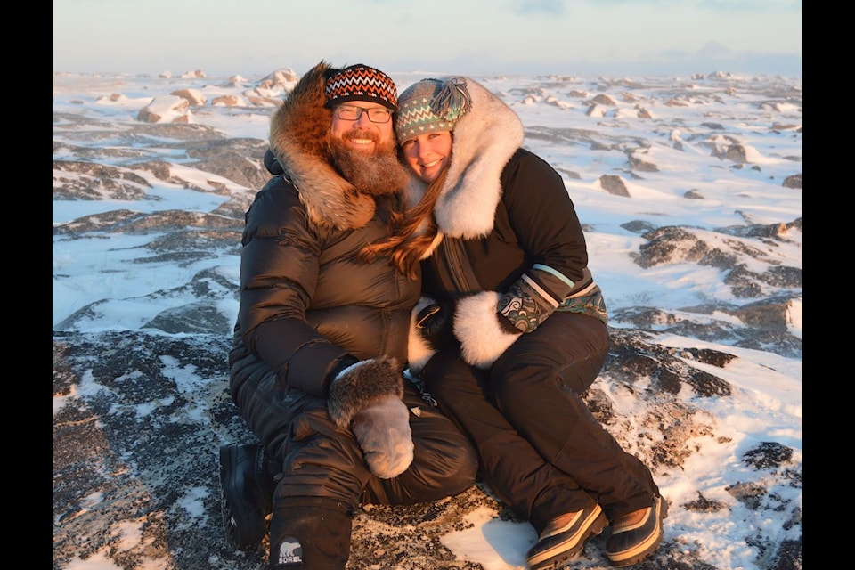 Glen Brocklebank, left, and his wife, Ana, spend a romantic moment with each other while out on the land in Chesterfield Inlet this past year.