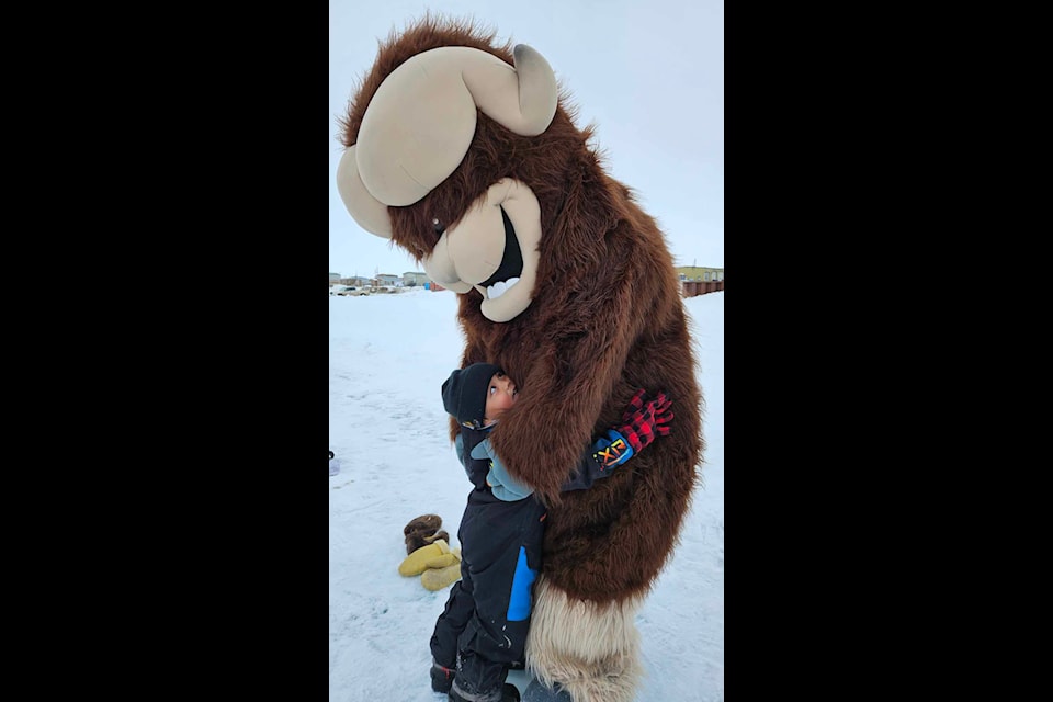 Three-year-old Ryder Mahik Ekpakohak found a best friend at the 2024 Umingmak Frolics held in Cambridge Bay. Ryder loves Ollie.