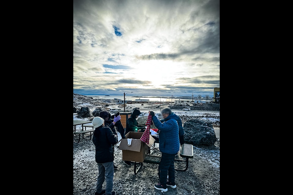 Distribution of clothing outside Sailijaaqvik Boarding Home on Oct. 25.