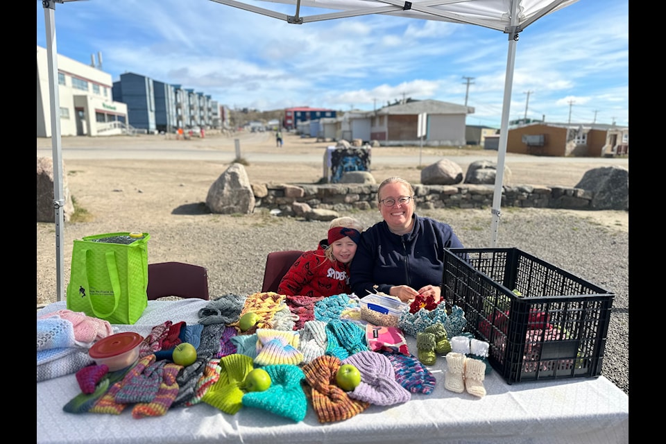 Anita and Henry Robertson with some  crocheted headgear in time for fall.