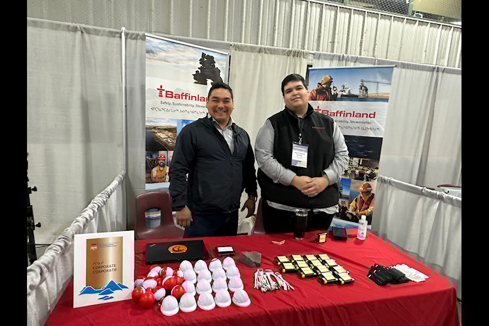 Michael Salomonie, manager of community relations and Jean-Francois Fortier-Doucet, Inuit recruitment specialist, at the Baffinland Iron Mines booth.
