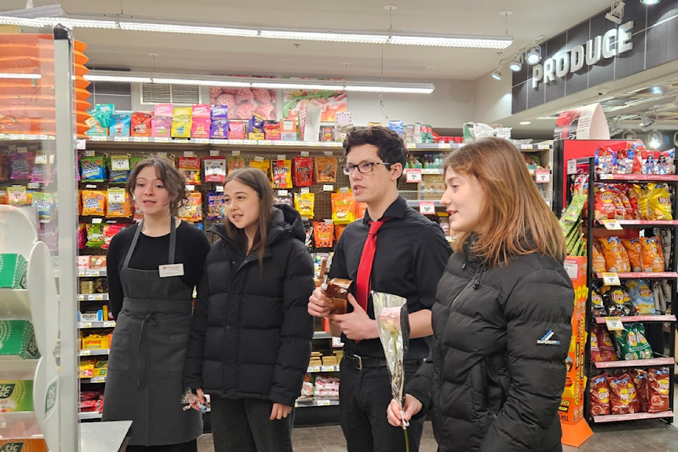 Love in the produce aisle, bank, dental office, wherever someone asks, Oak Bay High choral students deliver Love-A-Grams.