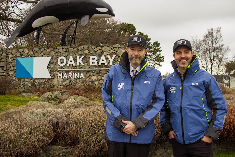 Graham Clarke, owner of Graham Clarke Group, left, and Brook Castelsky, CEO of Oak Bay Marine Group  at Oak Bay Marina Monday (Jan. 13) to announce the acquisition of OBMG by Graham Clarke Group.