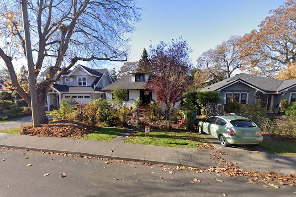 The proposed triplex would replace a single-family home.