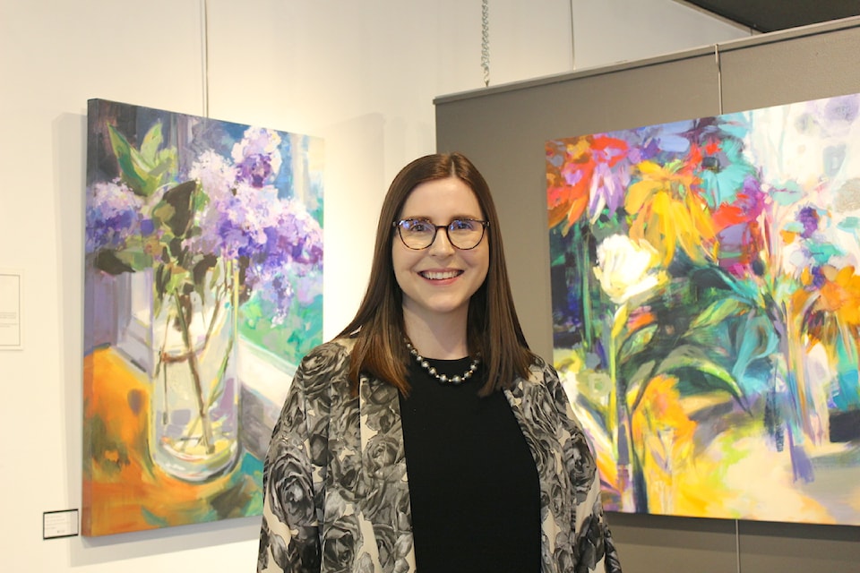 Kathleen Prince poses in The Avenue Gallery.